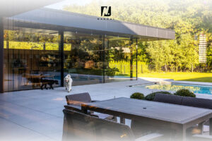 Przeszklenie szyba do szyby, system cienkoramowy – Naumal / Glass-to-glass glazing, slim-frame system – Naumal